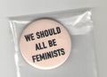 Значок. We should all be feminists
